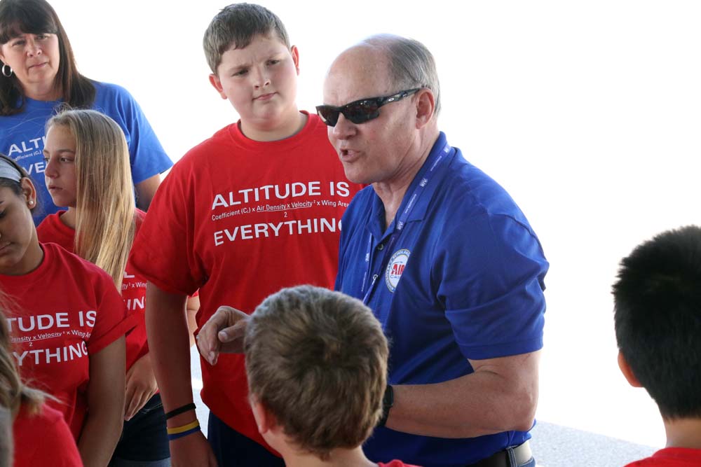 teacher talking to students