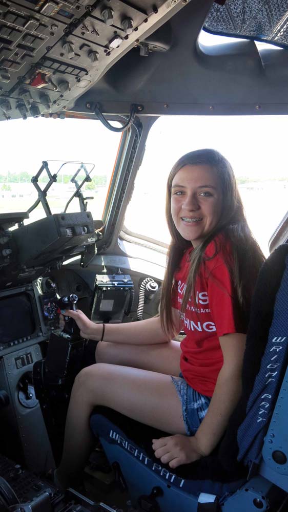 air camp student in plane