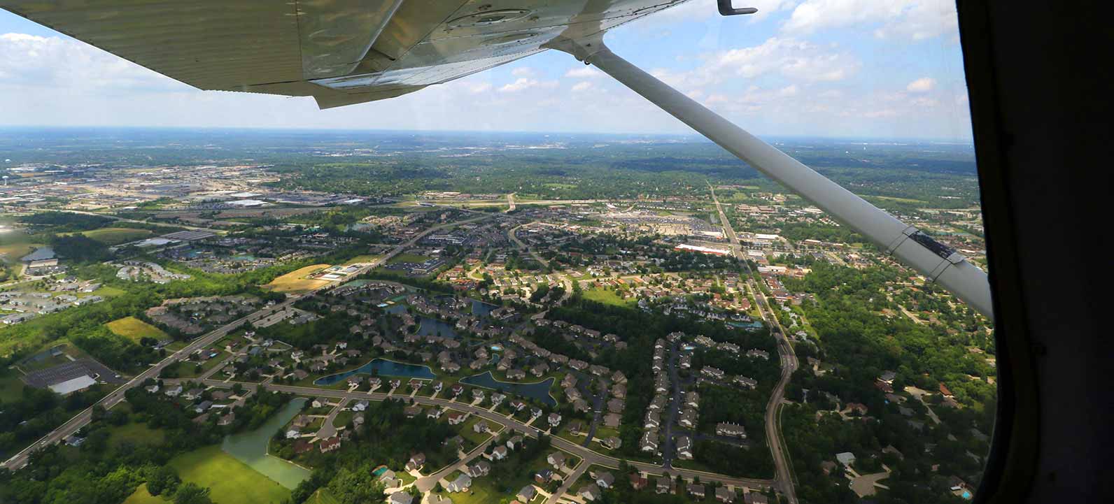 flying over neighborhood