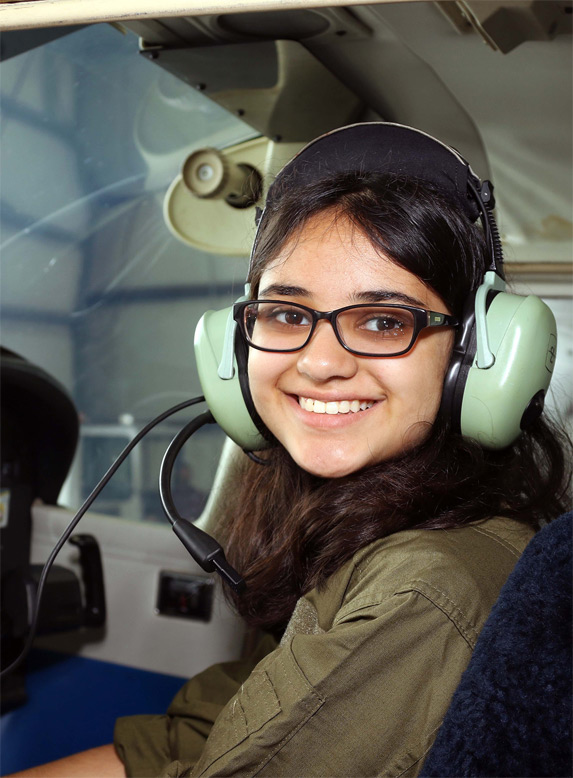 air camp student in pilot seat