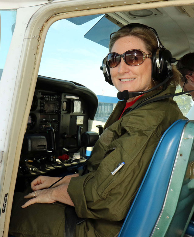 air camp teacher in pilot seat